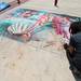 Street painter Taurus Burns re-creates "The Birth of Venus" by Sandro Botticelli on the sidewalk of East Washington street during the Ann Arbor Street Art Fair, Friday, July 19.
Courtney Sacco I AnnArbor.com 